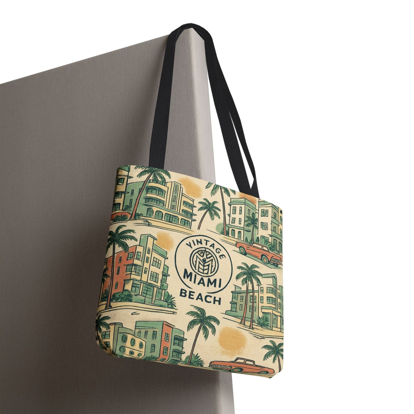 Tote bag with 'Vintage Miami Beach' design on a gray surface