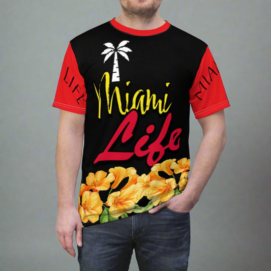 Person wearing a 'Miami Life' t-shirt with palm tree and flowers design.