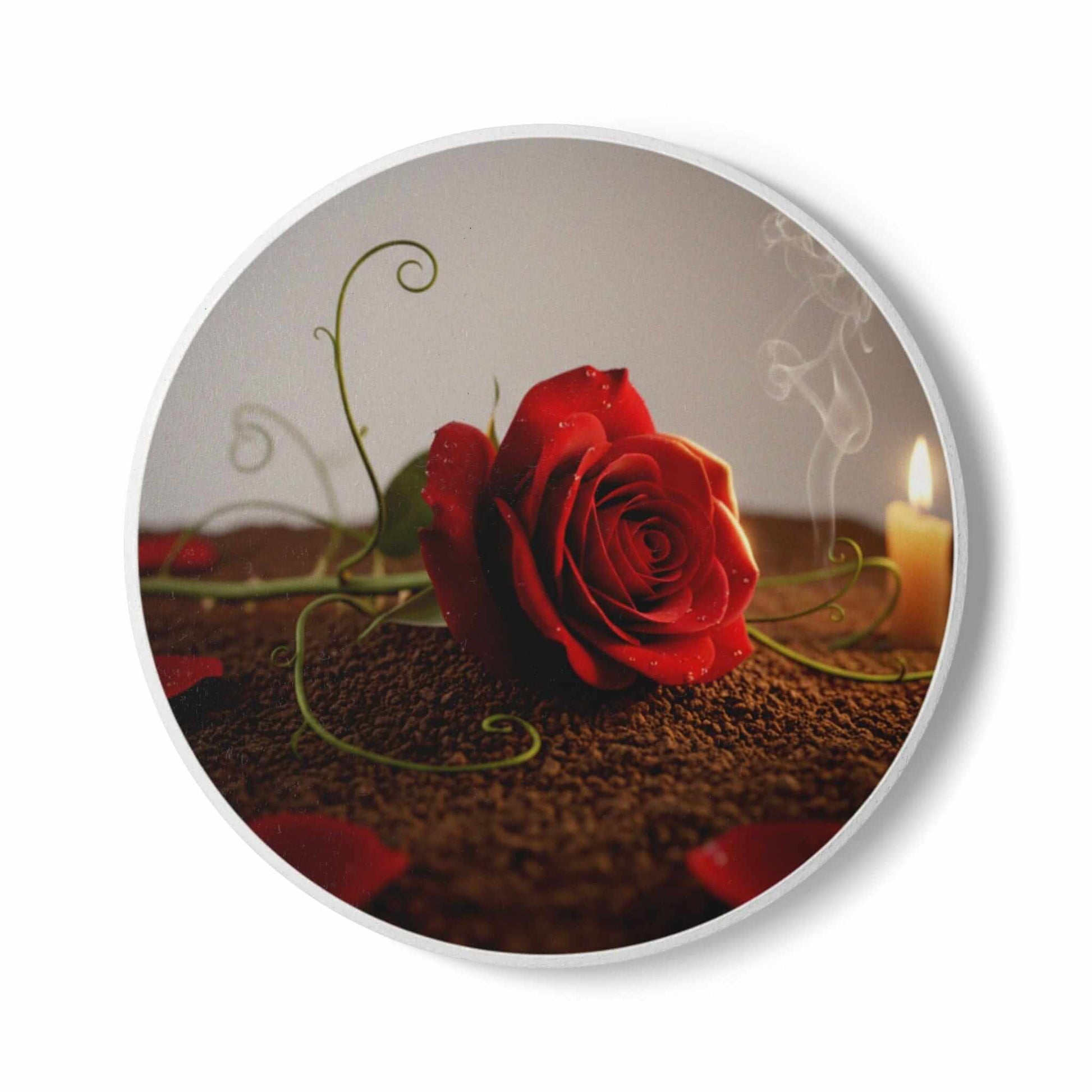 Romantic red rose candle with curled smoke on ceramic coaster and soil tabletop design