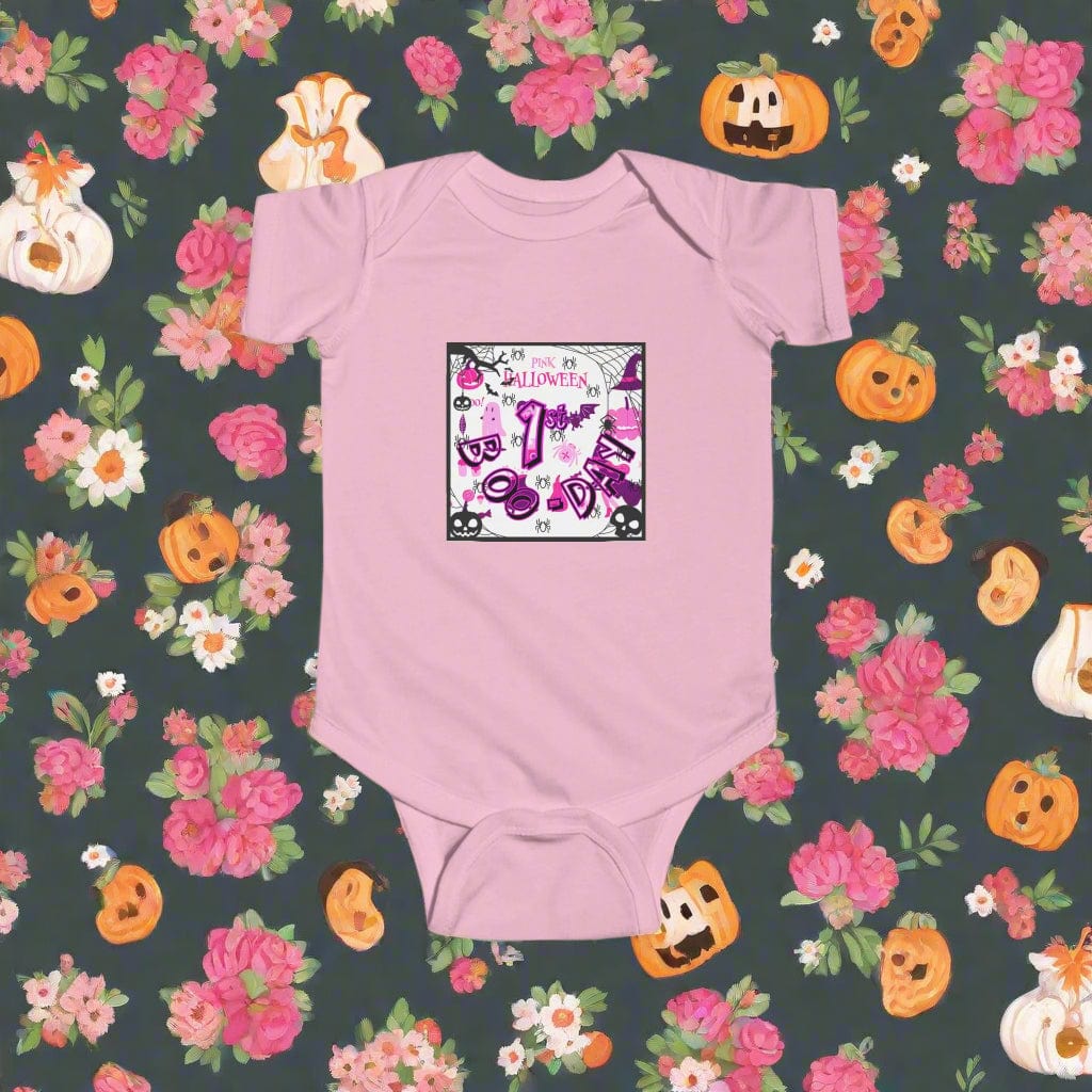 Pink baby onesie with Halloween-themed design on a white background
