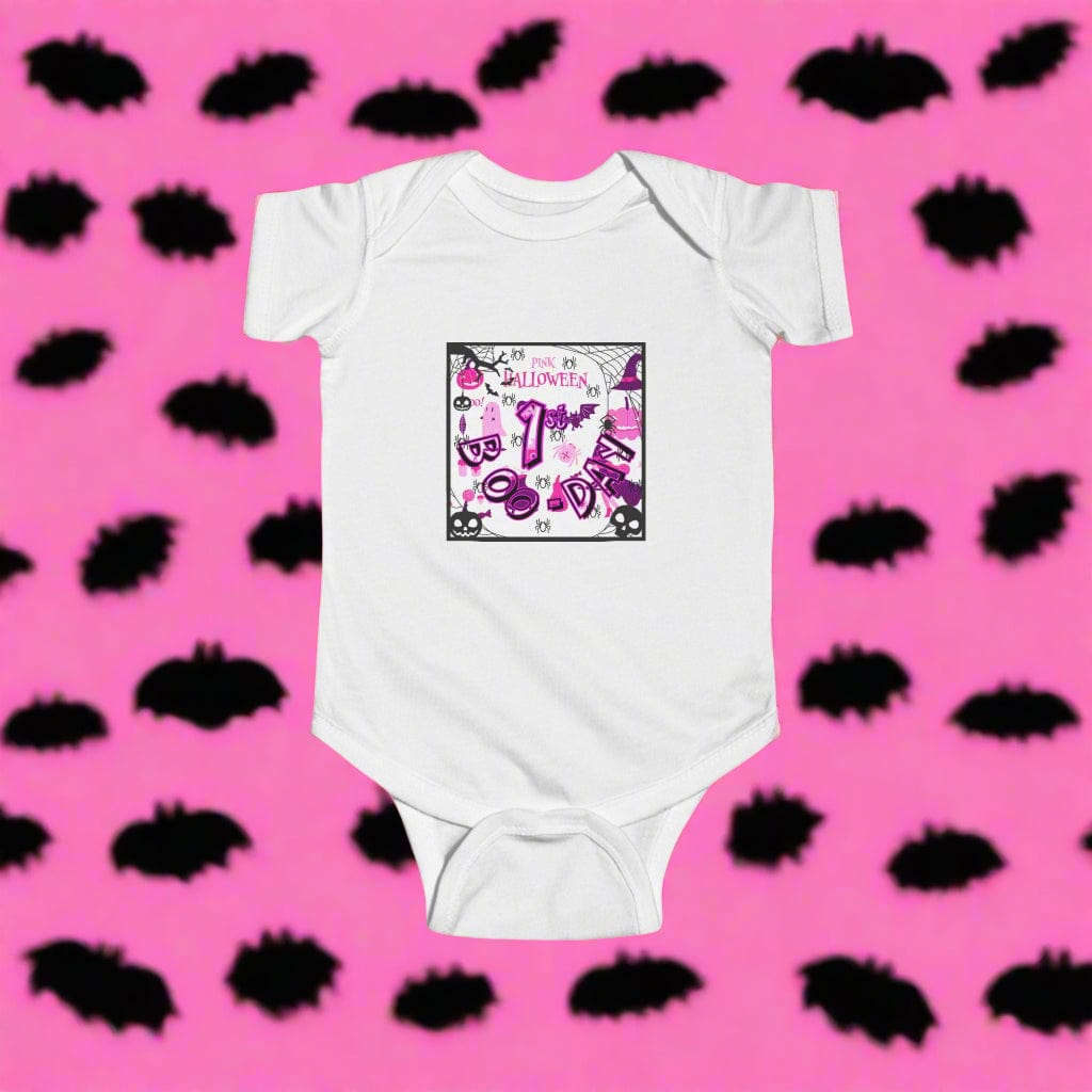 White baby onesie with pink and purple Halloween-themed design on a white background