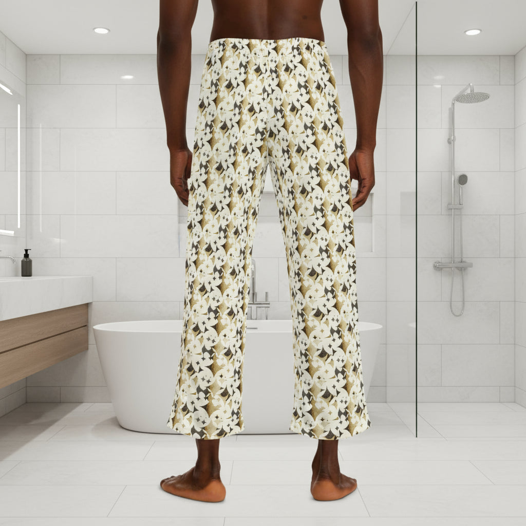 Monogram-patterned pants worn by a person on a white background