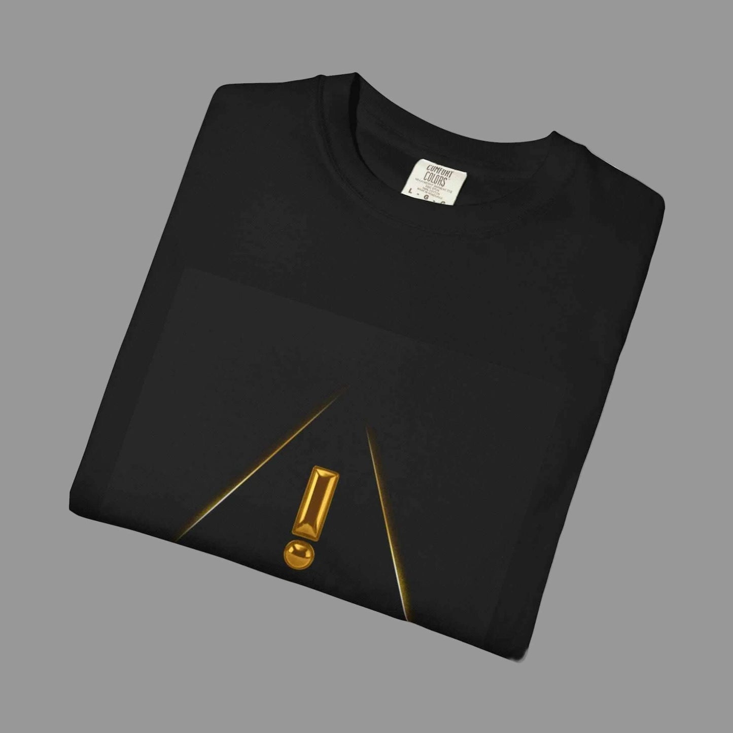 Folded black shirt with a gold button on a white background