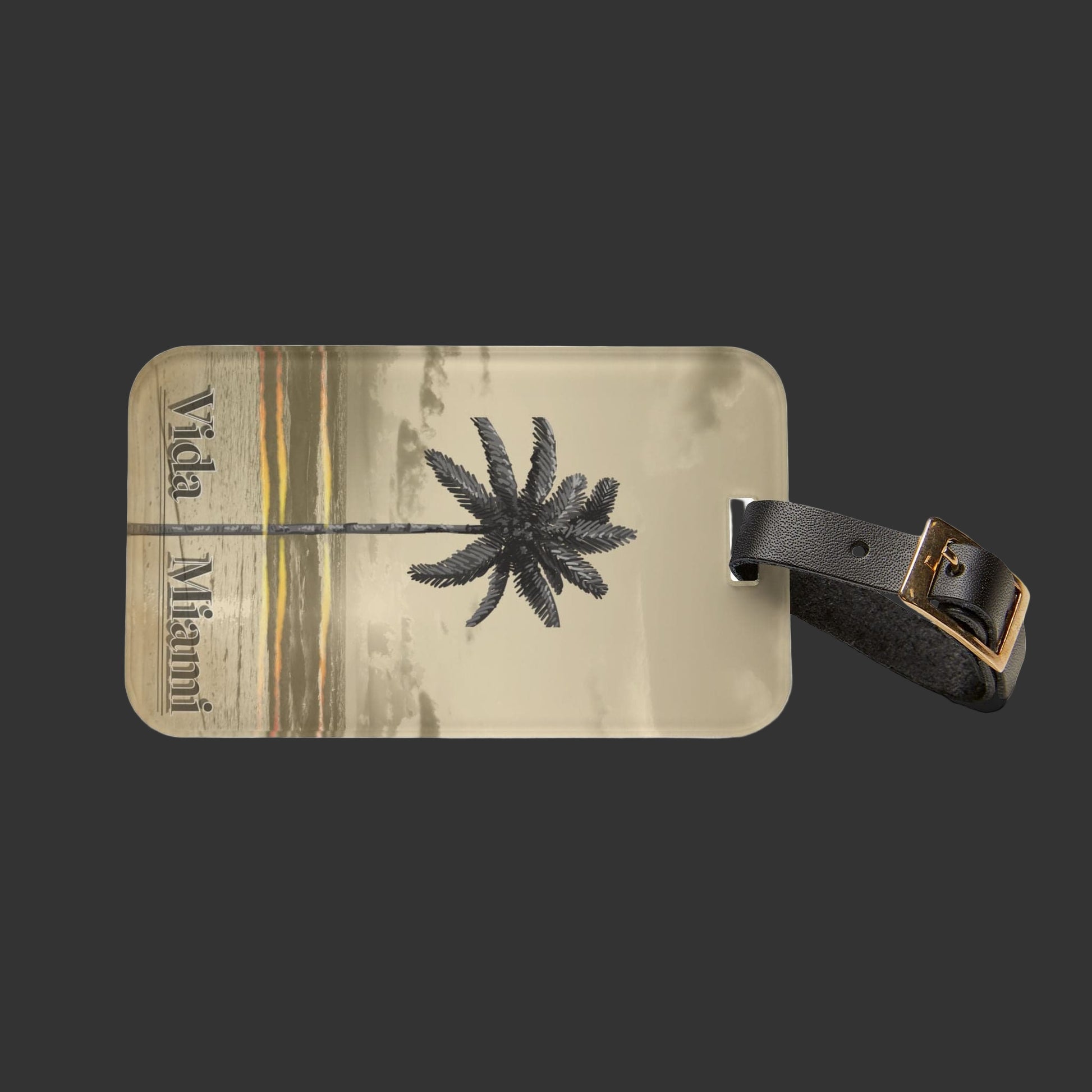 Luggage tag with palm tree design and 'Vida Miami' text on a white background