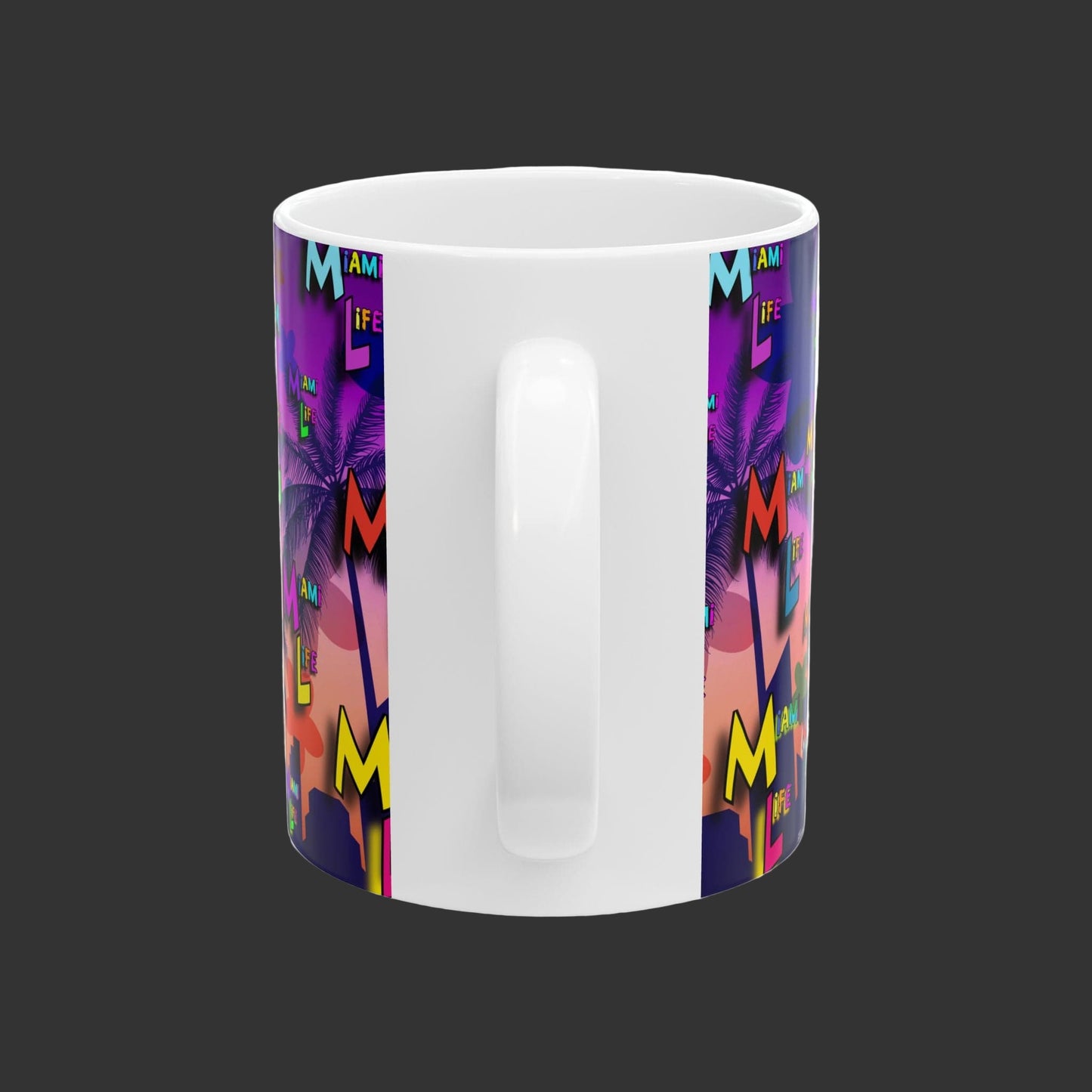 White mug with colorful 'M is for Me' design on a white background