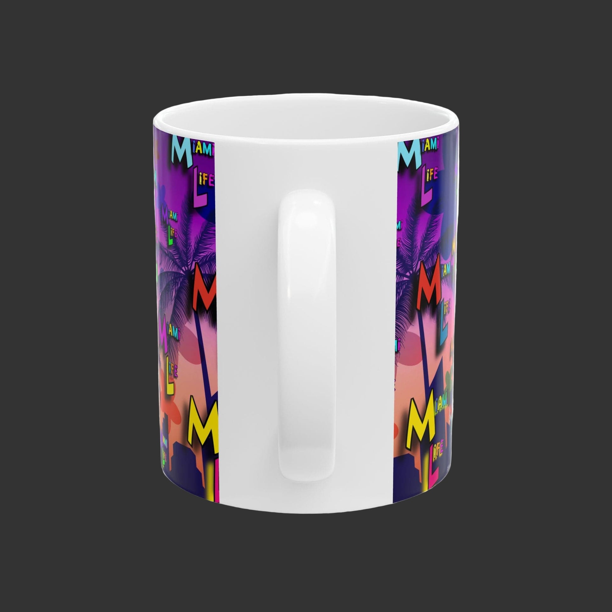 White mug with colorful 'M is for Me' design on a white background
