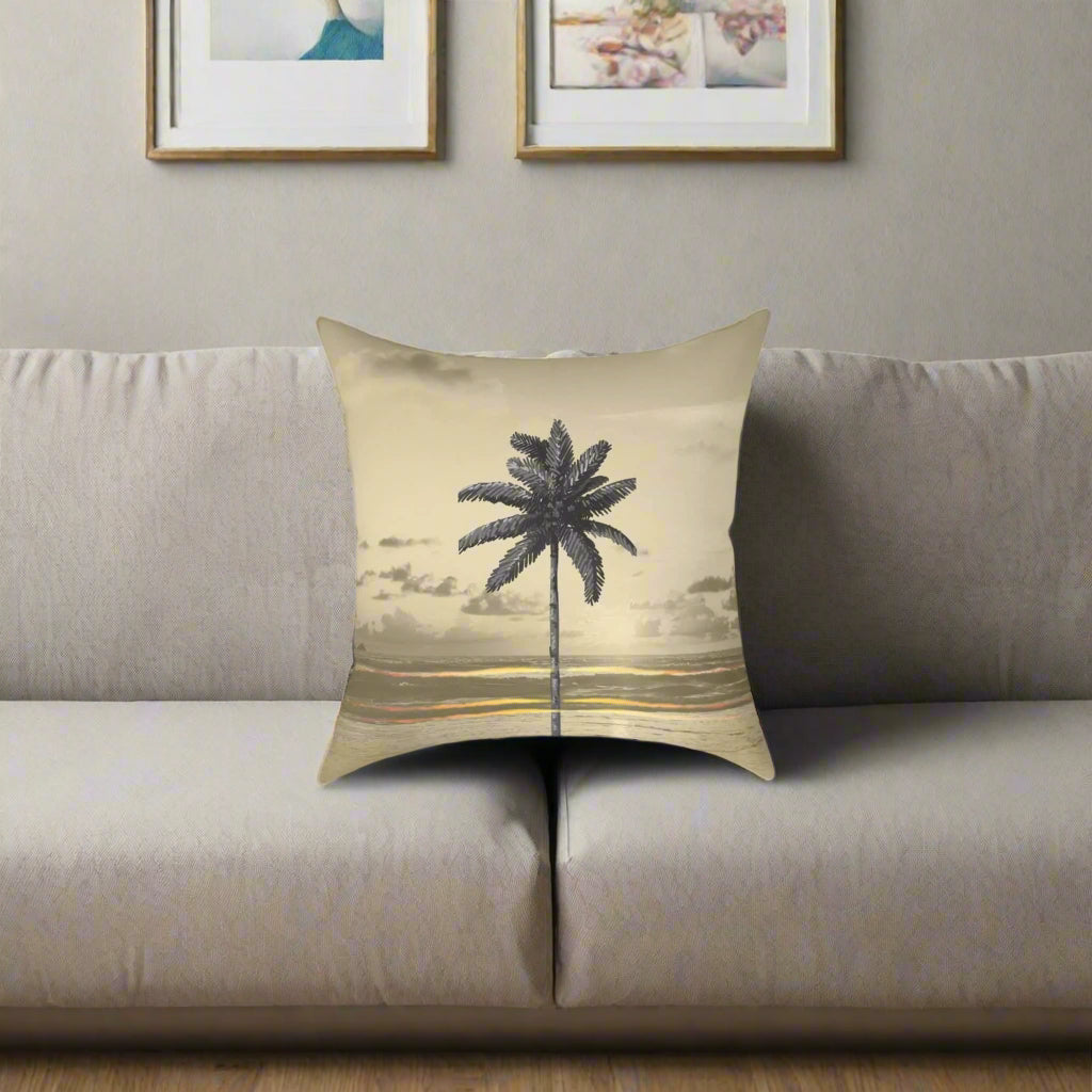 Decorative pillow with palm tree design on a beige background