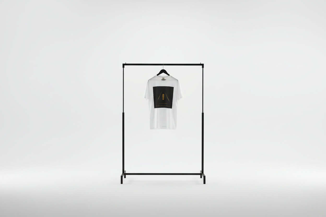 White t-shirt with a black graphic 'The Golden Standard of Awareness".