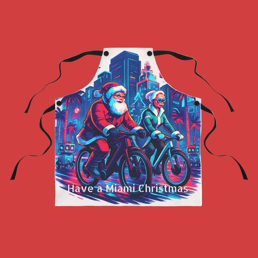Christmas apron with Miami-themed Santa and Mrs. Claus biking design