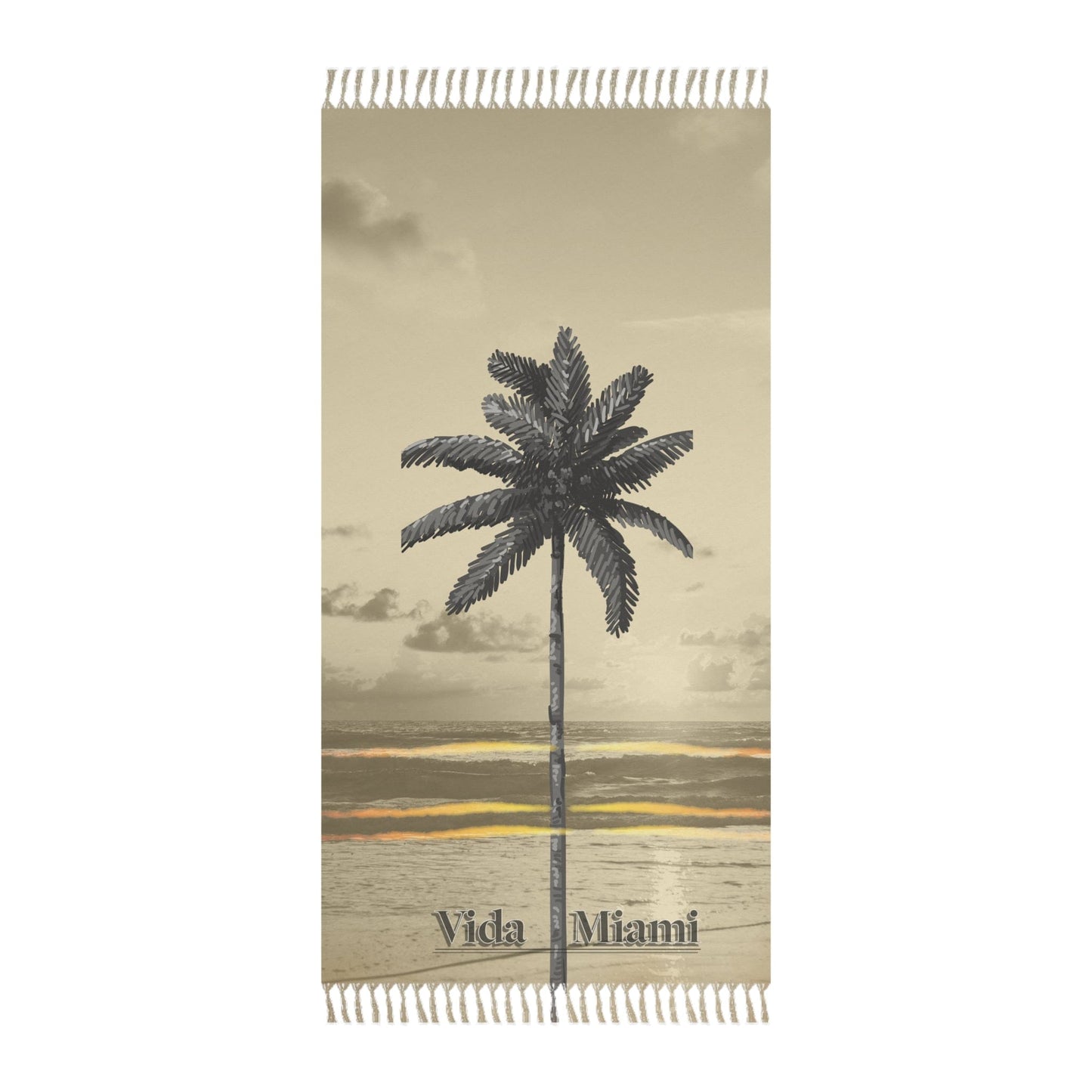 Beige towel with palm tree design and 'Vida Miami' text on a white background
