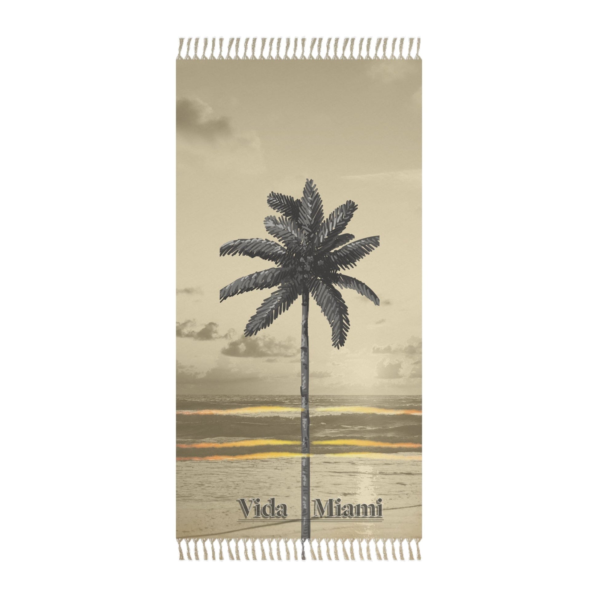 Beige towel with palm tree design and 'Vida Miami' text on a white background