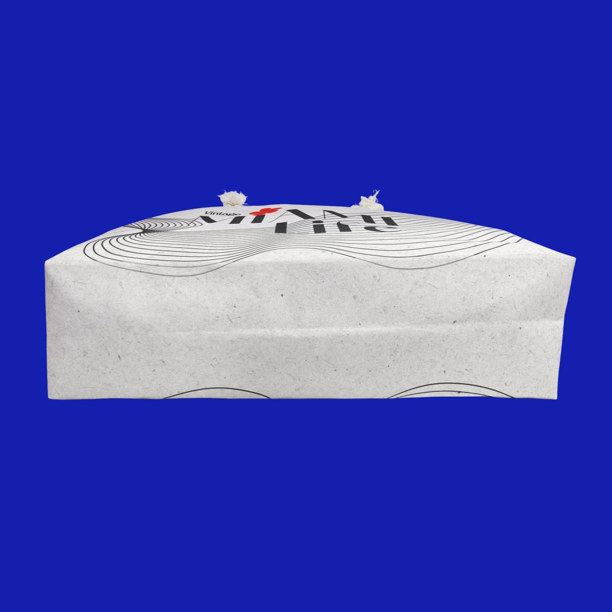 White shoebox with black text and design on a white background